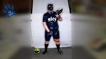 Play Rubber cyclist pup enjoying his gear (sniffing & pawing off)